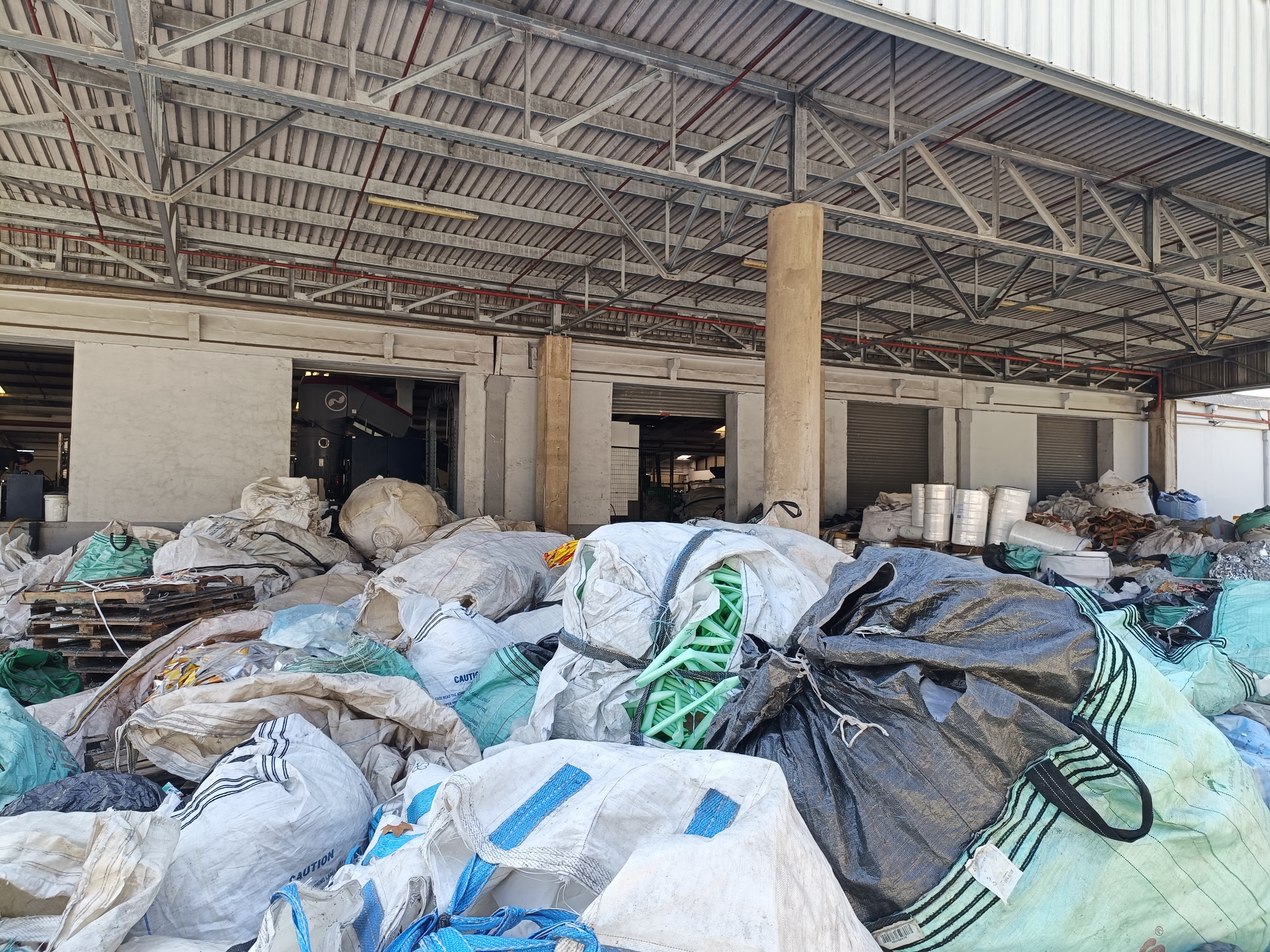 Warehouse storage of baled material